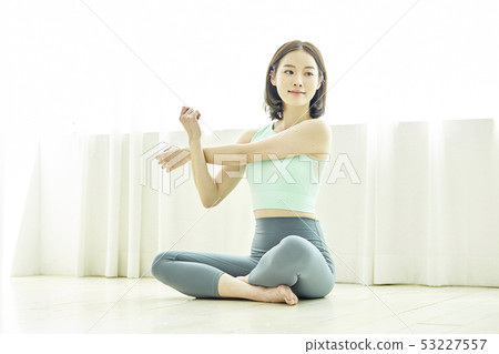 Stretching, exercise, fitness, young woman 53227557