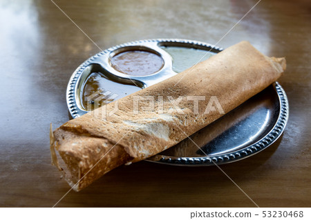 Thosai or tosai is popular indian food in Malaysia Thosai or tosai is popular indian food in Malaysia 53230468
