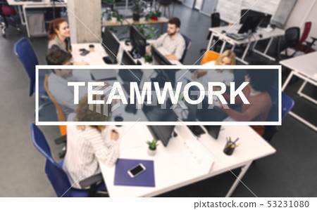 Teamwork inscription, young working people in modern office Teamwork inscription, young working people in modern office 53231080