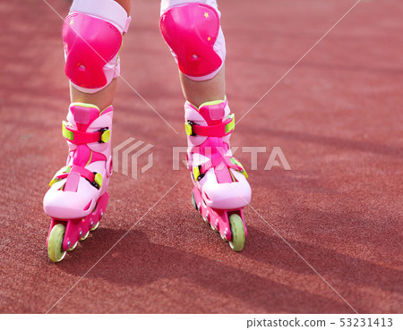 Rollerblades inline skates of a child closeup in 53231413
