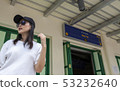 Beautiful smile Asia sunglass girl lady tour wait  53232640