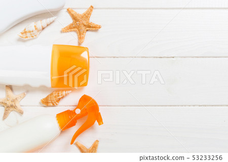 beach accessories on a wooden background top view 53233256