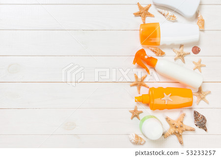 beach accessories on a wooden background top view 53233257