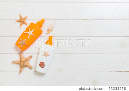 beach accessories on a wooden background top view 53233258