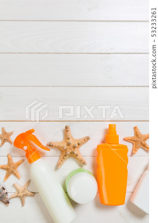 beach accessories on a wooden background top view 53233261
