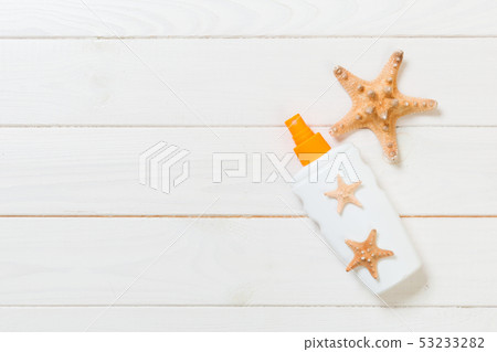 beach accessories on a wooden background top view 53233282