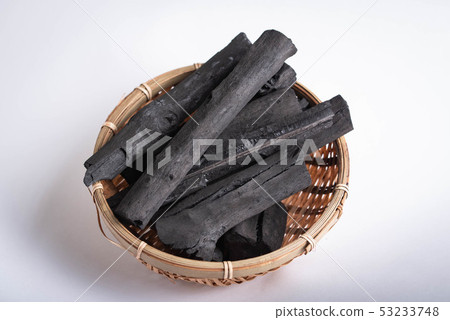 japanese charcoal in bamboo basket 53233748