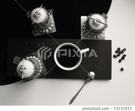 Coffee break with desserts and coffee beans, black and white Coffee break with desserts and coffee beans, black and white 53233813