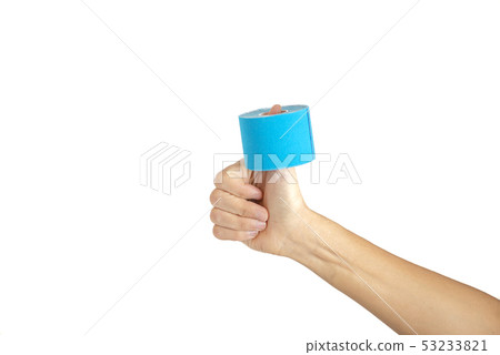 Woman hand holding kinesiotape isolated on white Woman hand holding kinesiotape isolated on white 53233821