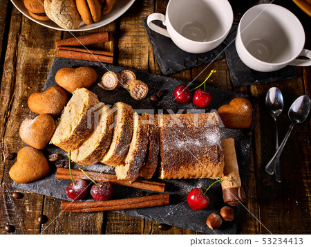 Oatmeal and nut cookies heart shape and sand rolled biscuit Oatmeal and nut cookies heart shape and sand rolled biscuit 53234413