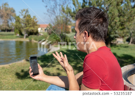 Young boy communicating with sign language Young boy communicating with sign language 53235187