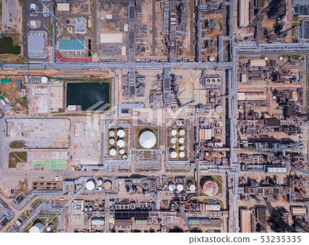 Aerial view of petrochemical oil refinery and sea 53235335