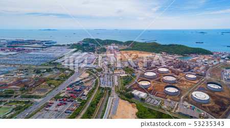 Aerial view of petrochemical oil refinery and sea 53235343