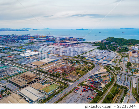 Aerial view of petrochemical oil refinery and sea 53235344