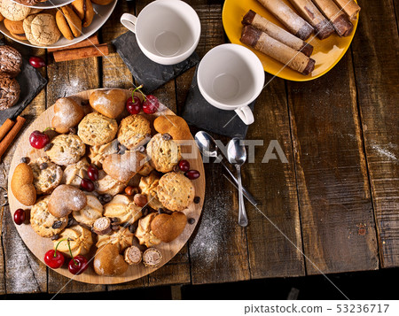 Oatmeal cookies and sand chocolate cake with cherry berry 53236717