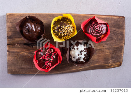Colorful chocolate homemade muffins 53237013