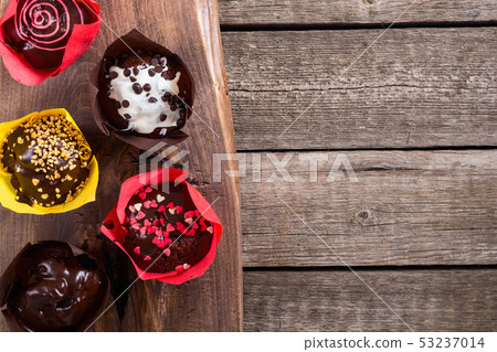 Colorful chocolate homemade muffins 53237014