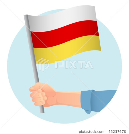 south ossetia flag in hand 53237678