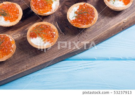 Tartalets with red caviar Tartalets with red caviar 53237913