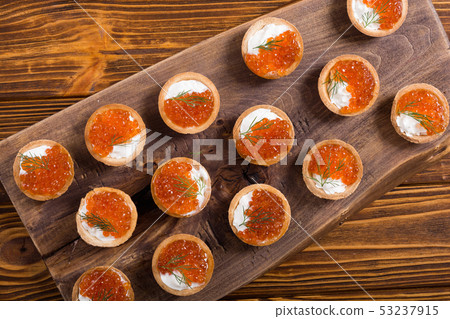 Tartalets with red caviar 53237915