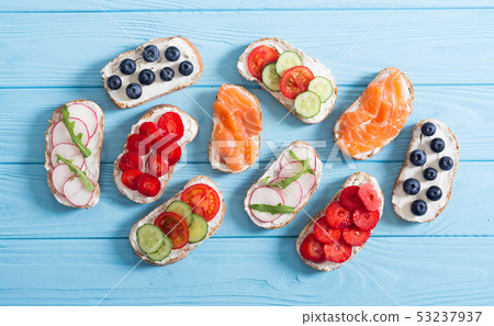 Variation of toast with fruit , vegetable and 53237937
