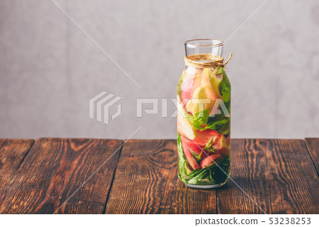 Infused Water with Peach and Basil. 53238253