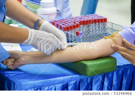 Medical selective syringe on arm patient Medical selective syringe on arm patient 53246968