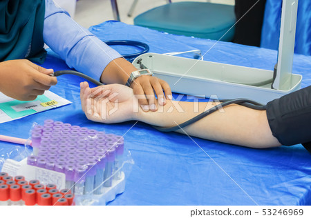 measuring checking health blood pressure arm measuring checking health blood pressure arm 53246969