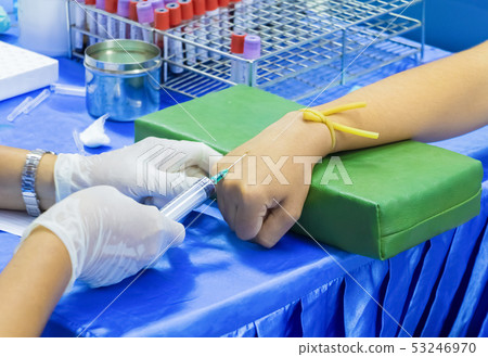 Medical selective syringe on arm patient Medical selective syringe on arm patient 53246970