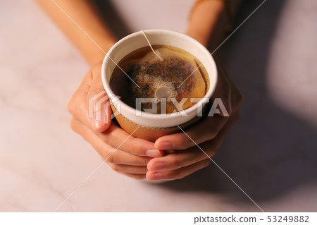 Wrapped in warm tea 53249882