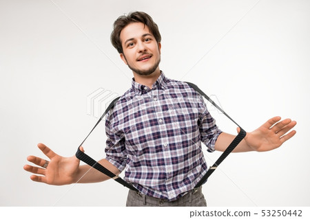 Handsome brunette in plaid shirt view 53250442