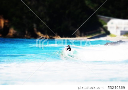 Landscape of people doing marine sports on the beach Landscape of people doing marine sports on the beach 53250869