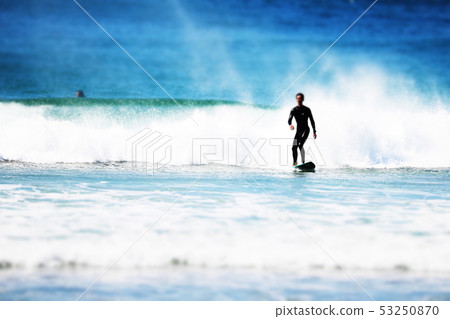 Landscape of people doing marine sports on the beach Landscape of people doing marine sports on the beach 53250870