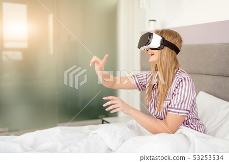 young blond girl playing games young blond girl playing games 53253534