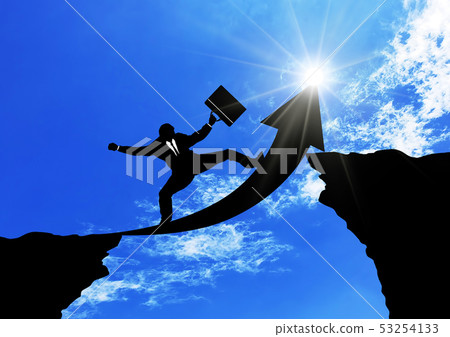 Businessman crossing the arrow bridge 53254133