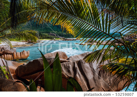 Tropical secluded beach framed by nature foliage on the trekking tour through the jungle to hidden 53259807