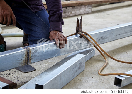 The welders are welding steel in the factory The welders are welding steel in the factory 53263362
