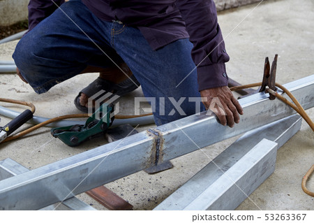 The welders are welding steel in the factory The welders are welding steel in the factory 53263367
