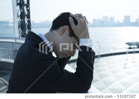 Worried businessman Worried businessman 53287107