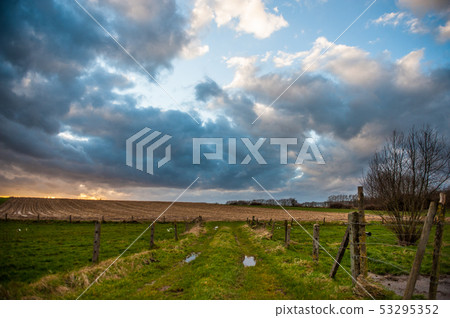 Dirt road in the flemish countryside 53295352