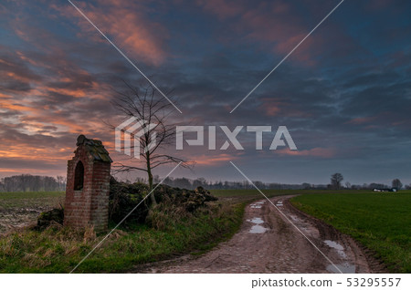 sunrise over a country road. 53295557