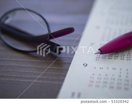 Business image · Calendar · Glasses · Women 53320342