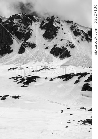 Black and white high mountain with snow cornice Black and white high mountain with snow cornice 53327130