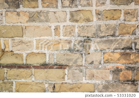 aged yellow brick wall aged yellow brick wall 53331020