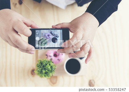 Chubby fat woman taking a photo of Donut and Chubby fat woman taking a photo of Donut and 53358247