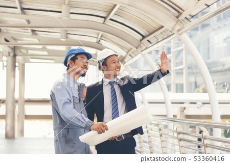 Engineer and Construction manager Foreman working Engineer and Construction manager Foreman working 53360416