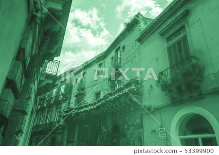 Baroque facede decorated with flowers in Italy. Baroque facede decorated with flowers in Italy. 53399900