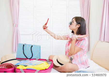 Asian beauty selfie when packing 53460970