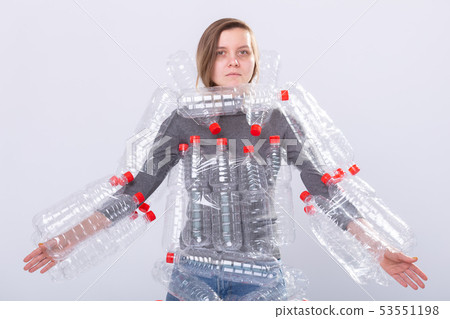 Plastic pollution problem and environment protection. Weak tired woman with plastic bottles. Save 53551198