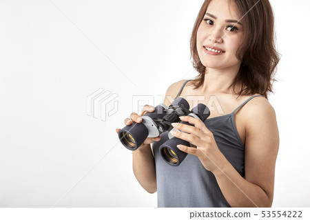 Young Asian woman with binoculars Young Asian woman with binoculars 53554222
